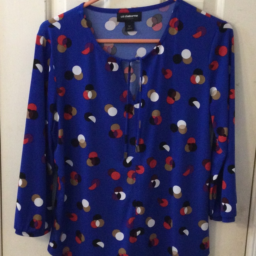 Royal blue blouse perfect for the office or Zoom calls.